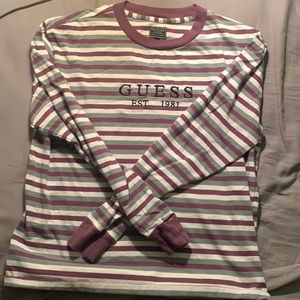 Small, multiple color long sleeve guess shirt.